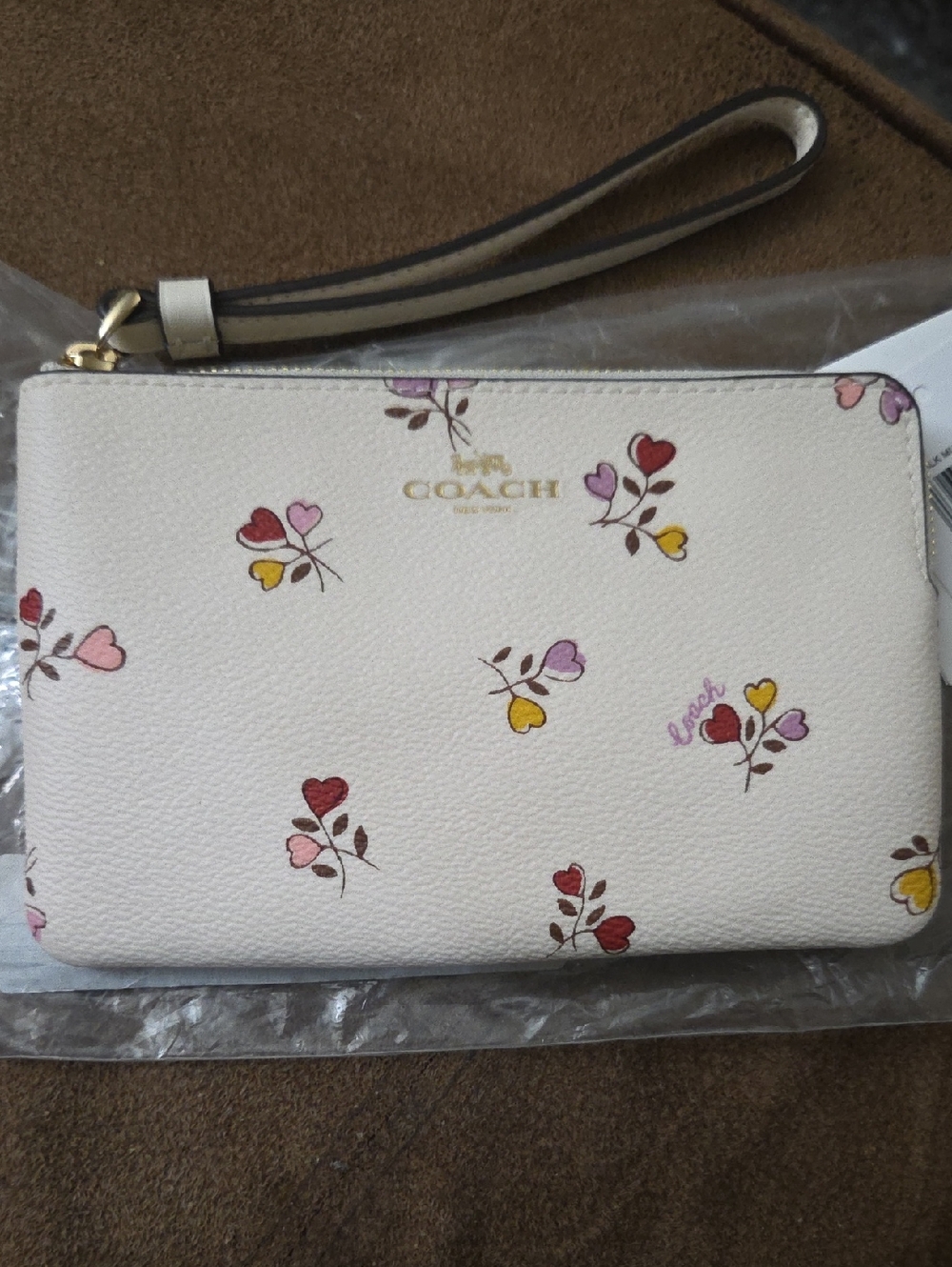 COACH Cream Floral Heart Print Wristlet with Gold Logo